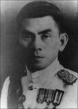 Rear Admiral Thawal Thamrong Navaswadhi, also spelled Thawal Thamrongnavasawat, (November 21, 1901—December 3, 1988) was the 8th Prime Minister of Thailand from 1946-1947.<br/><br/>

A career naval officer of Chinese ancestry, Admiral Thamrong was a leading member of the anti-Japanese Seri Thai resistance movement during World War II. He became Thailand's elected Prime Minister on August 23, 1946, replacing Khuang Abhaiwongse. However, he was removed from office by a military coup orchestrated by Field Marshall Plaek Pibulsonggram on November 8, 1947. Pibulsonggram then assumed the post of prime minister once more.